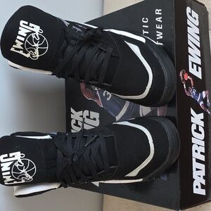 Patrick Ewing Black and White High-Top Sneakers.